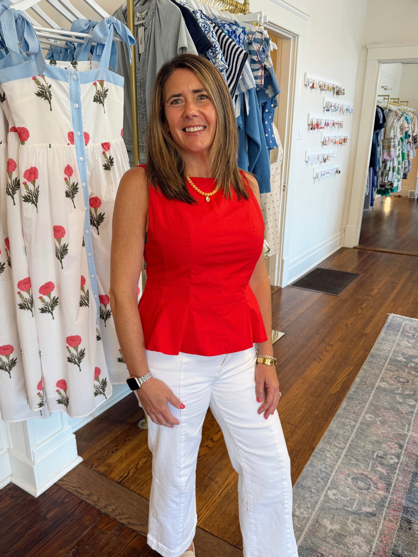 Sara Sleeveless Peplum Top